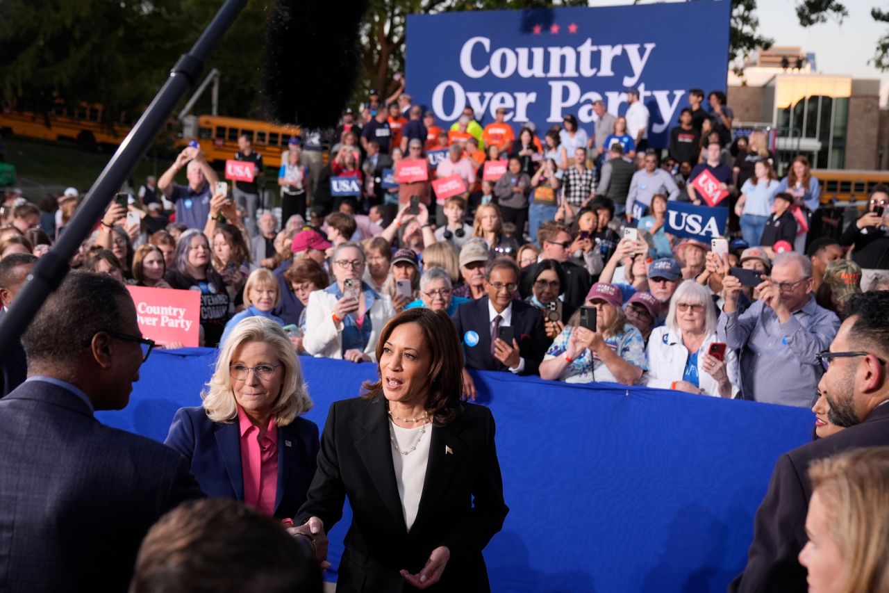 Kamala Harris, right, and Liz Cheney, greet attendees during a campaign event at Ripon College in Ripon, Wisconsin, on October 3.