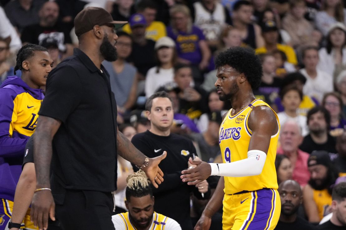 LeBron James cut a reserved figure for most of the game as he watched his son Bronny.