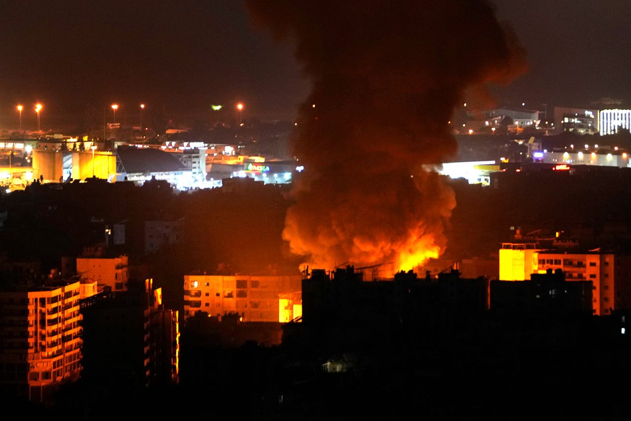 Flames and smoke rise from an Israeli airstrike in Dahiyeh, Beirut, Lebanon, early Sunday, October 6.