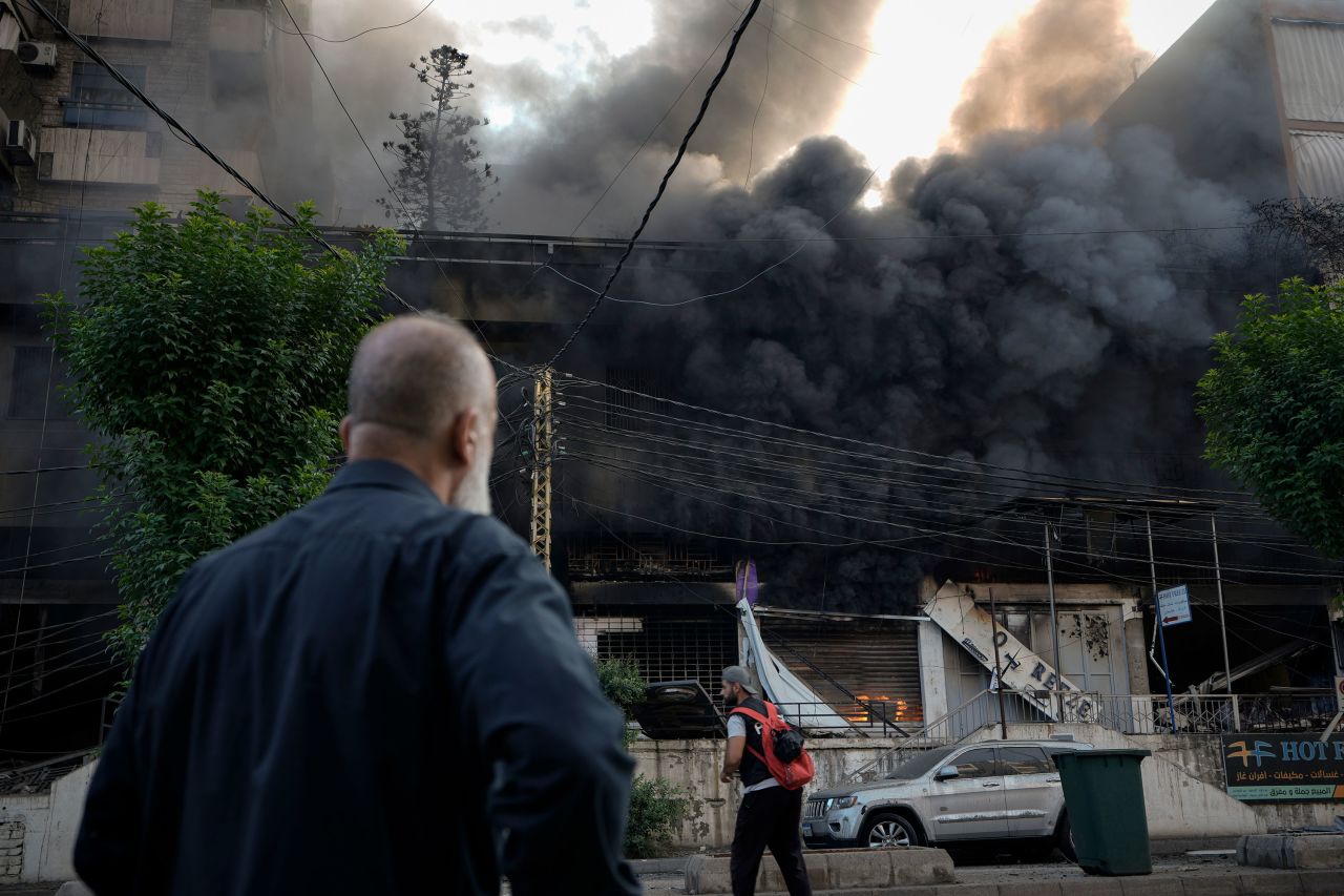 Flames and smoke rise from a destroyed building at the site of an Israeli airstrike in Dahiyeh, in the southern suburbs of Beirut, Lebanon, on Sunday.