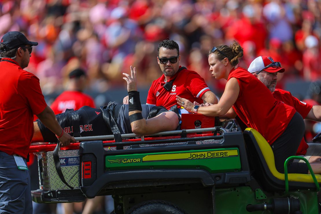 Grayson McCall was stretchered off the field after taking a hit to the head in the NC State Wolfpack's game against Wake Forest on October 5.