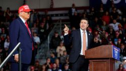 Rep. Bryan Steil, R-Wis., speaks as Republican presidential nominee former President Donald Trump listens during a campaign rally at Dodge County Airport, Sunday, Oct. 6, 2024, in Juneau, Wis.