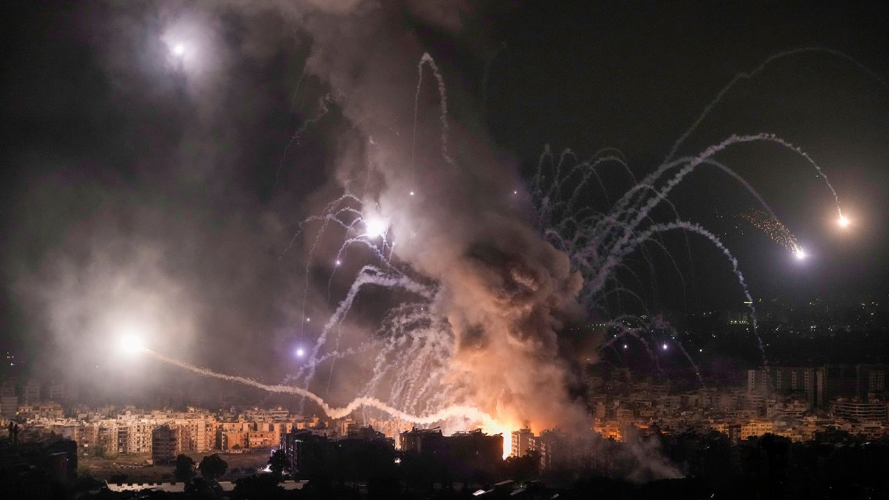 Flames and smoke rise from an Israeli airstrike in Dahiyeh, Beirut, Lebanon, on October 7.