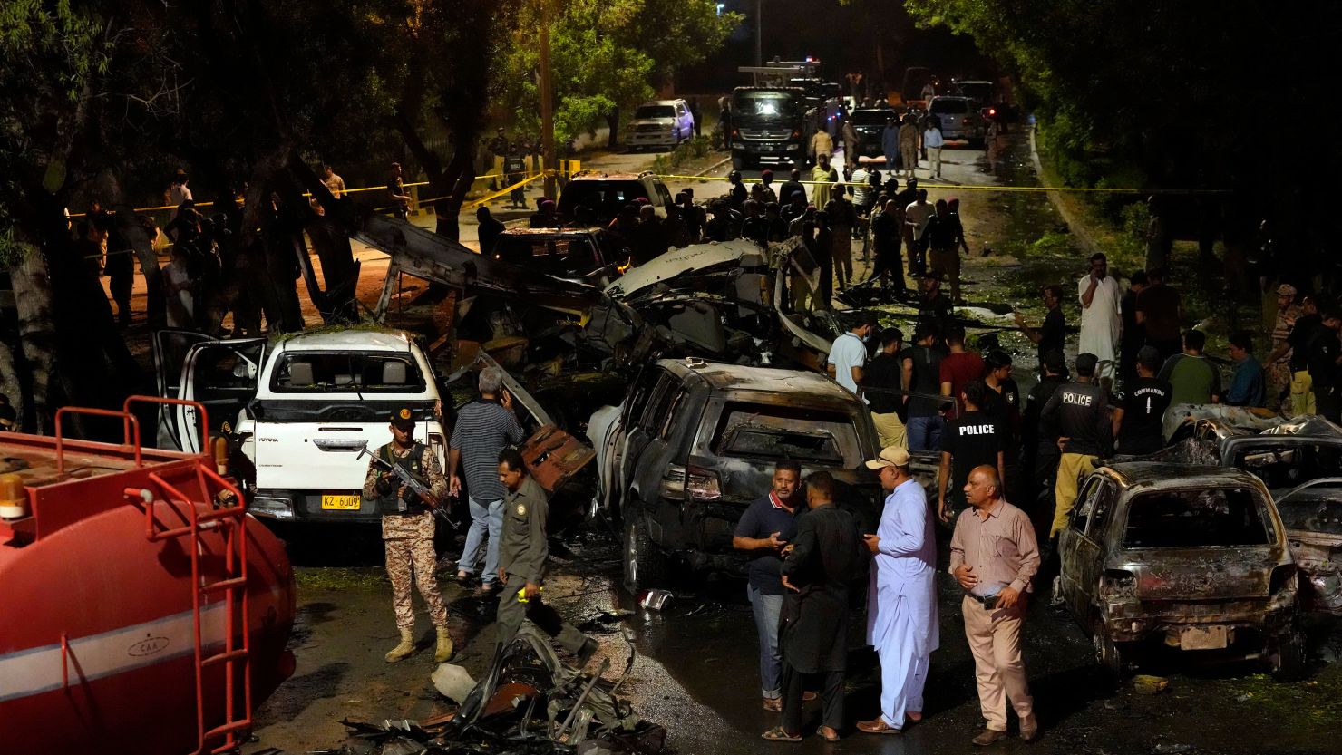 Security officials early Monday examined the site of the explosion outside Karachi's international airport.