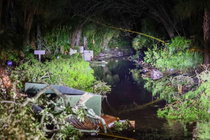 Debris clogs a roadway in Siesta Key on Thursday.