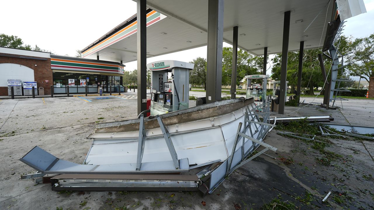 Debris and an awning of a gas station sits on the ground the morning after Hurricane Milton hit the region, Thursday, Oct. 10, 2024, in Tampa, Fla.