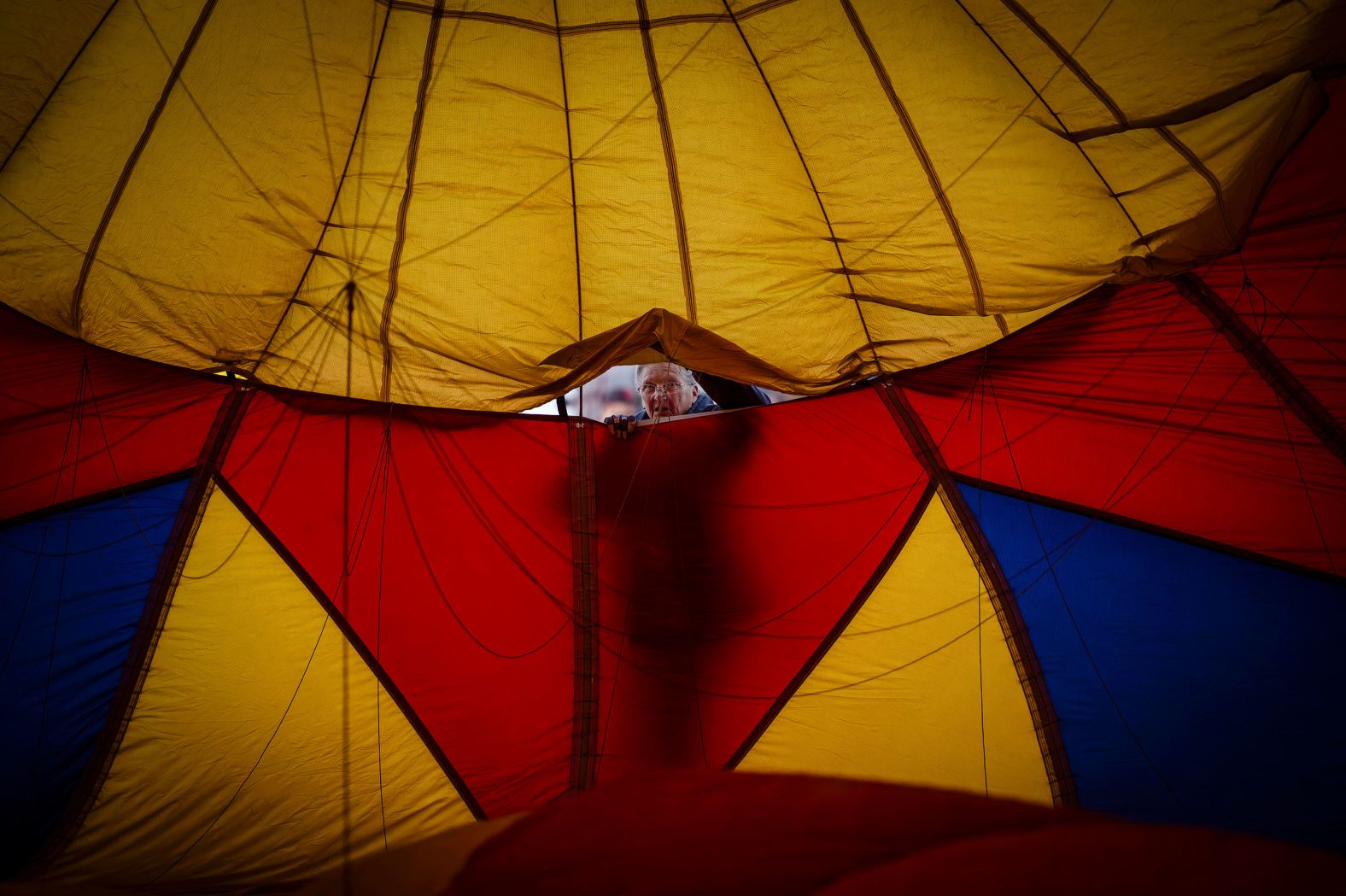 Denise Morgan helps set up the Saki Bomber hot-air balloon during the Albuquerque Aloft event in Albuquerque, New Mexico, on Friday, October 4.