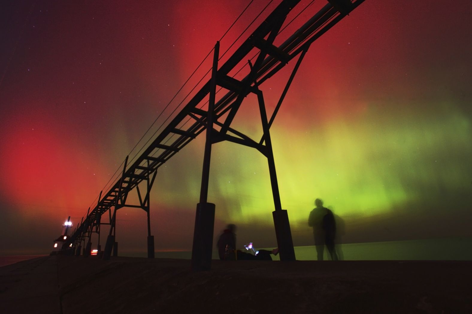 The night sky is illuminated above Lake Michigan on Thursday in St. Joseph, Michigan.