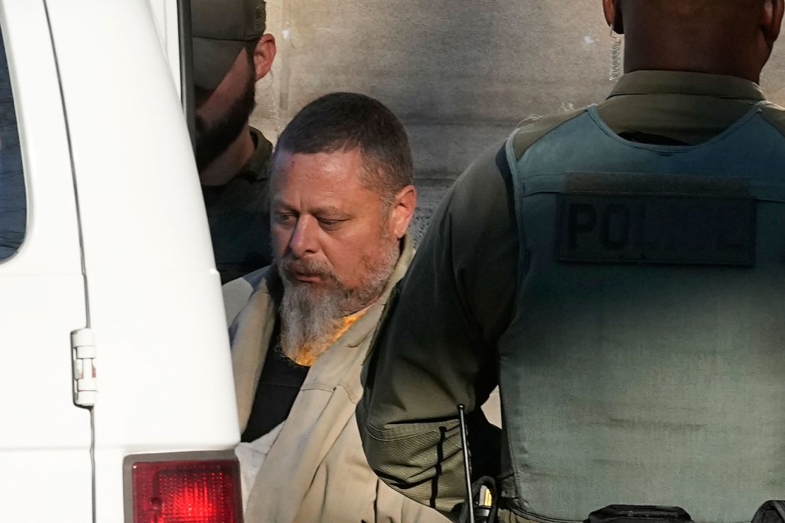 Officers escort Richard Allen from the Carroll County Courthouse following a hearing on November 22, 2022 in Delphi, Indiana.