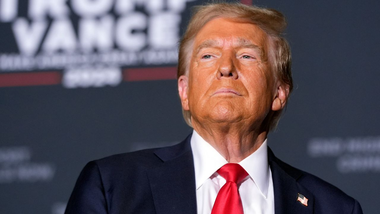 Republican presidential nominee former President Donald Trump arrives for a campaign rally at the Gaylord Rockies Resort & Convention Center, Friday, Oct. 11, 2024, in Aurora, Colo. (AP Photo/Alex Brandon)