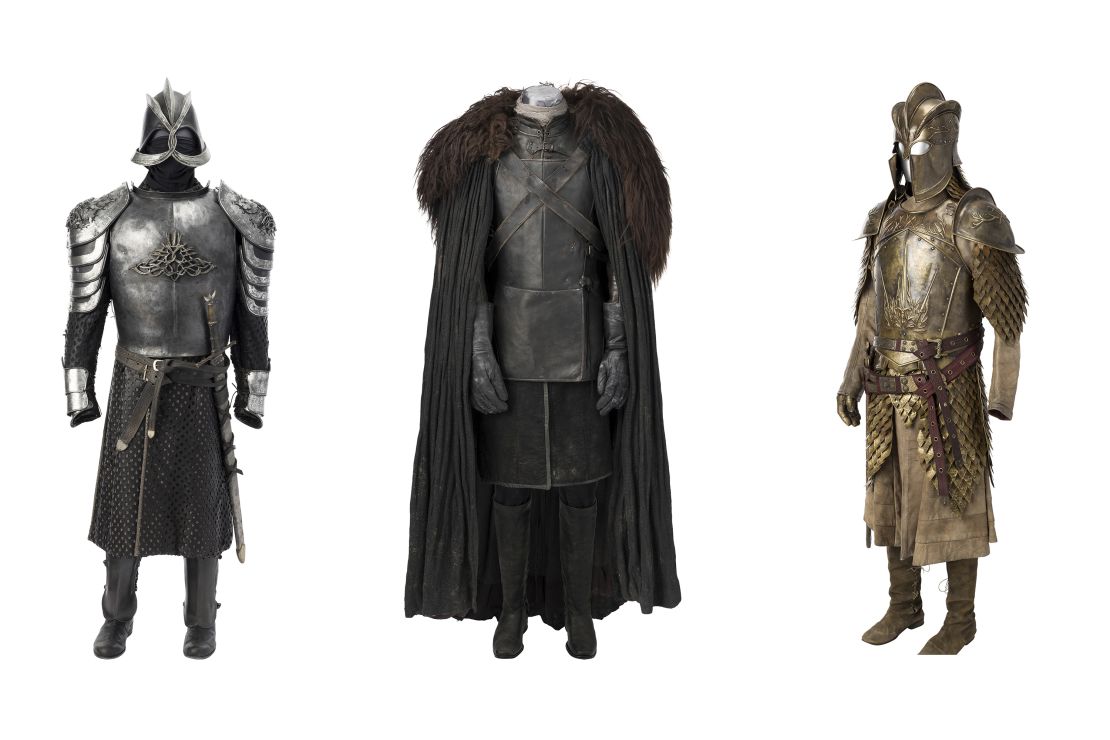 Various costumes were among the items on sale, including, from left, armor worn by Gregor "The Mountain" Clegane, Jon Snow's Night's Watch ensemble and Jaime Lannister's full Kingsguard armor.