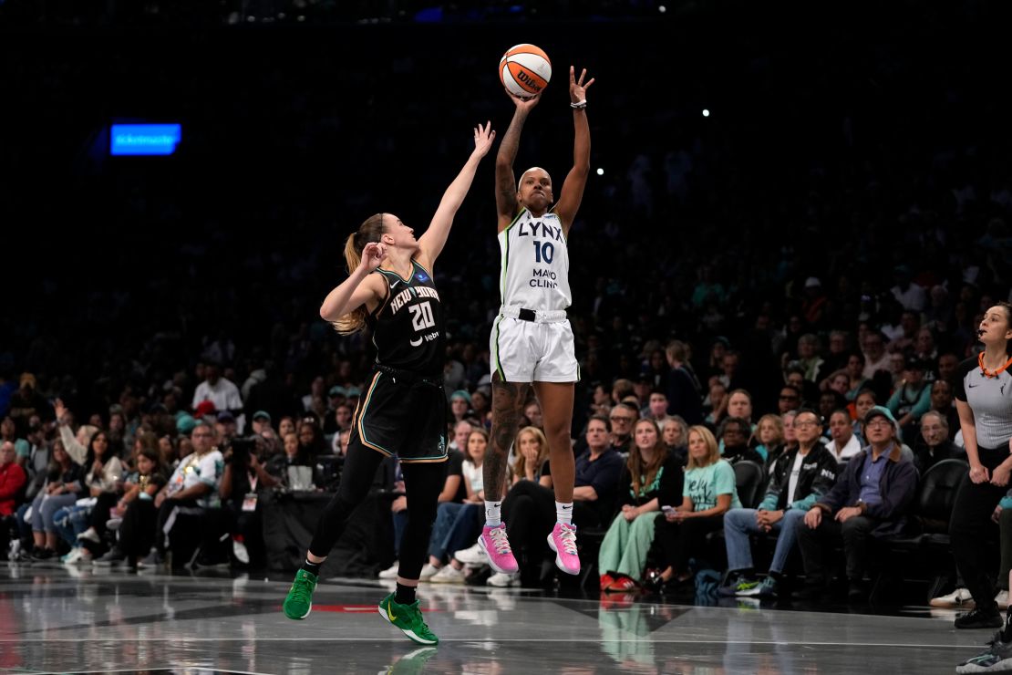 Minnesota Lynx guard Courtney Williams shoots over New York Liberty star Sabrina Ionescu in Game 2 of the WNBA Finals.