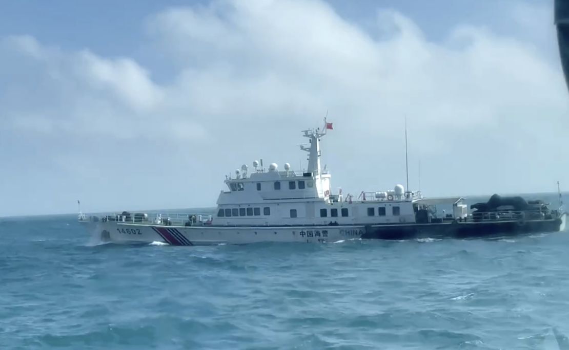 This screen grab from a video released by the Taiwan Coast Guard shows a China Coast Guard boat from a Taiwan Coast Guard boat as it passes near the coast of Matsu islands, Taiwan on Monday, Oct. 14, 2024.