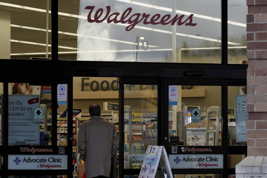 A customer walks to a Walgreens store in Wheeling, Illinois, on Tuesday, Oct. 15, 2024.