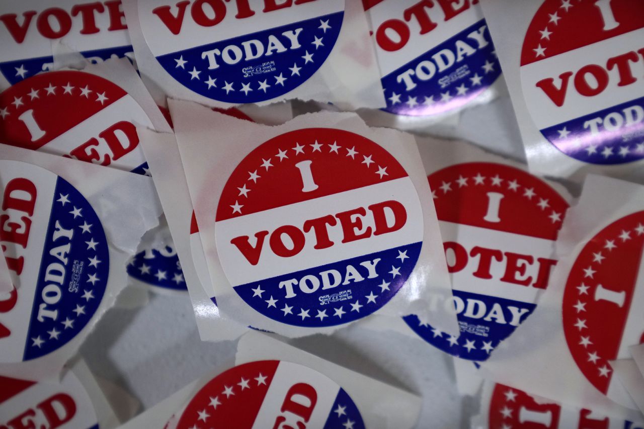 "I voted" stickers are seen during early voting on Wednesday, October 16, in Des Moines, Iowa.