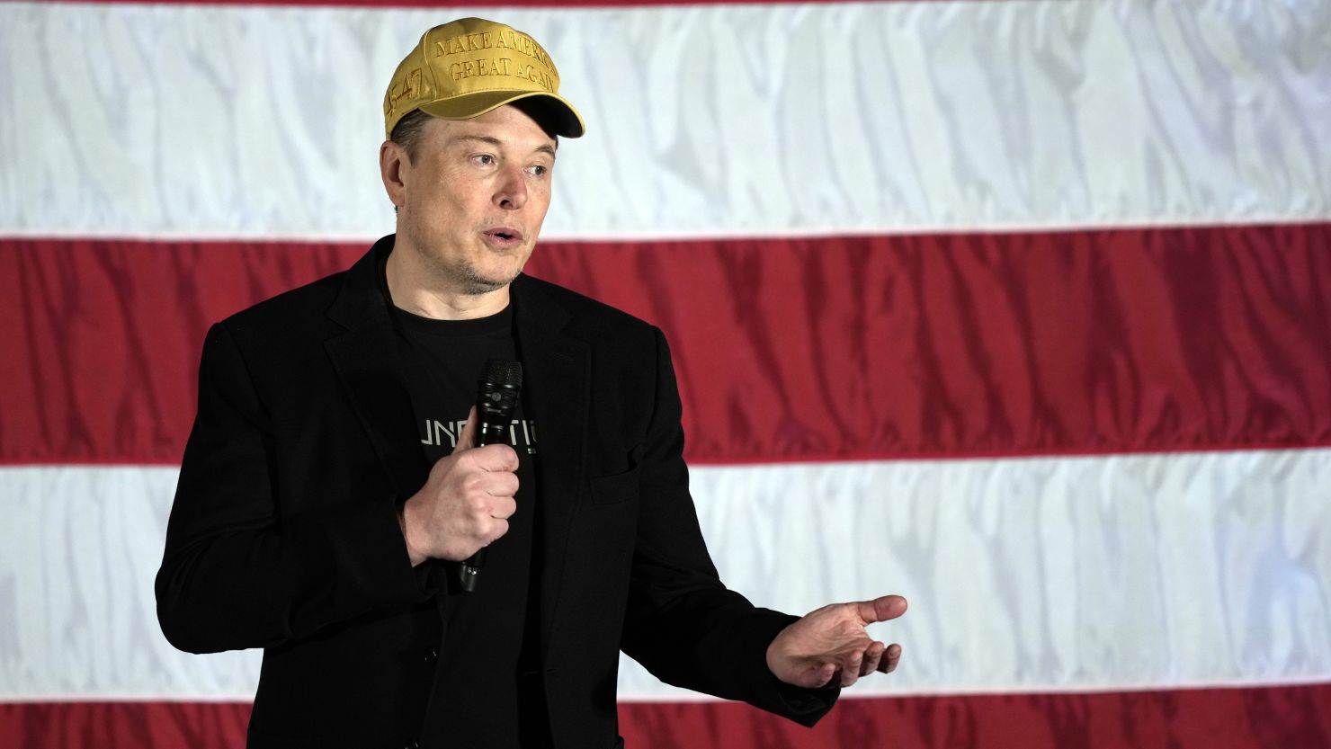 Elon Musk speaks to voters in support of former President Donald Trump in Folsom, Pa., on Oct. 17, 2024.