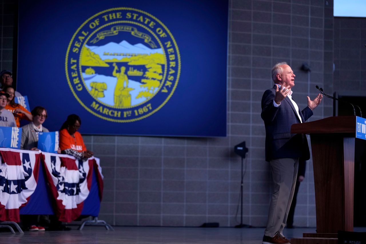 Minnesota Gov. Tim Walz speaks during a campaign rally on Saturday, October 19, in Papillion, Nebraska.