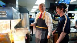 Republican presidential nominee former President Donald Trump works behind the counter during a visit to McDonald's in Feasterville-Trevose, Pa., Sunday, Oct. 20, 2024.