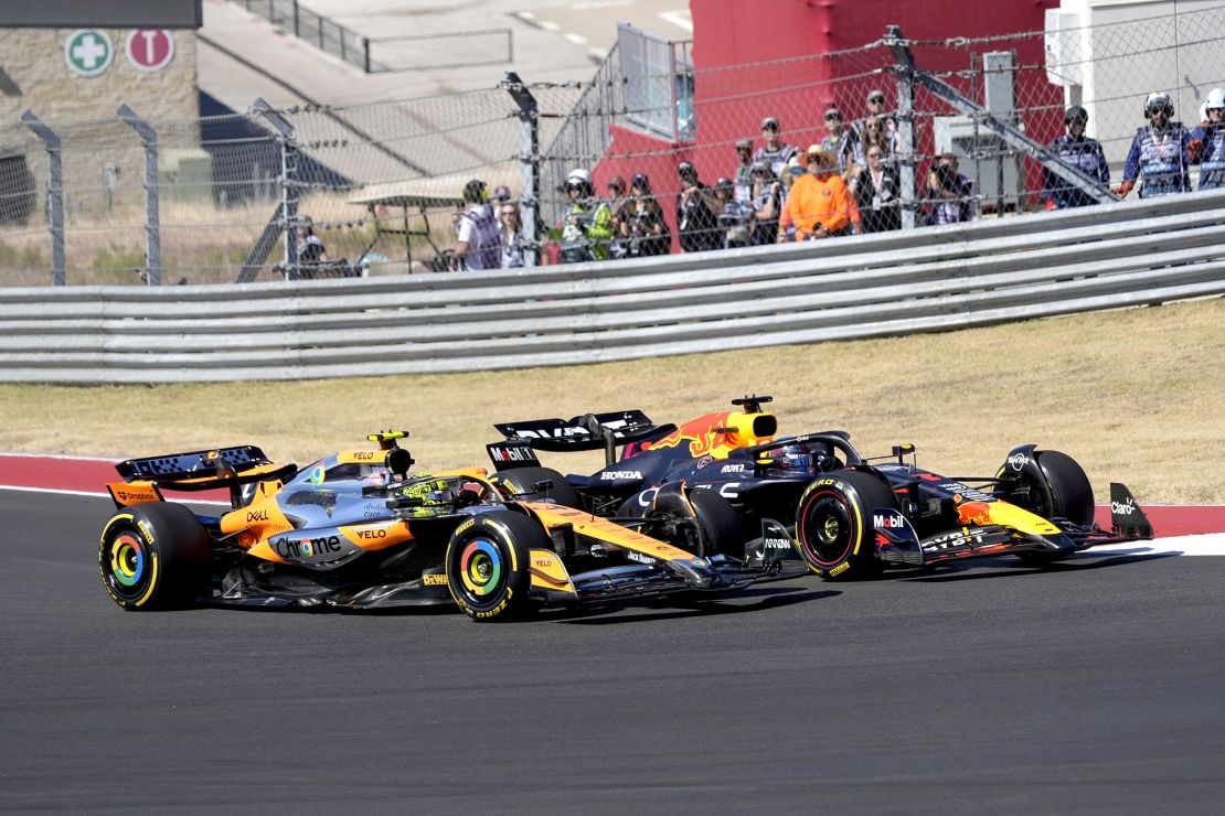 Norris (left) and Verstappen race through a turn during the US Grand Prix.