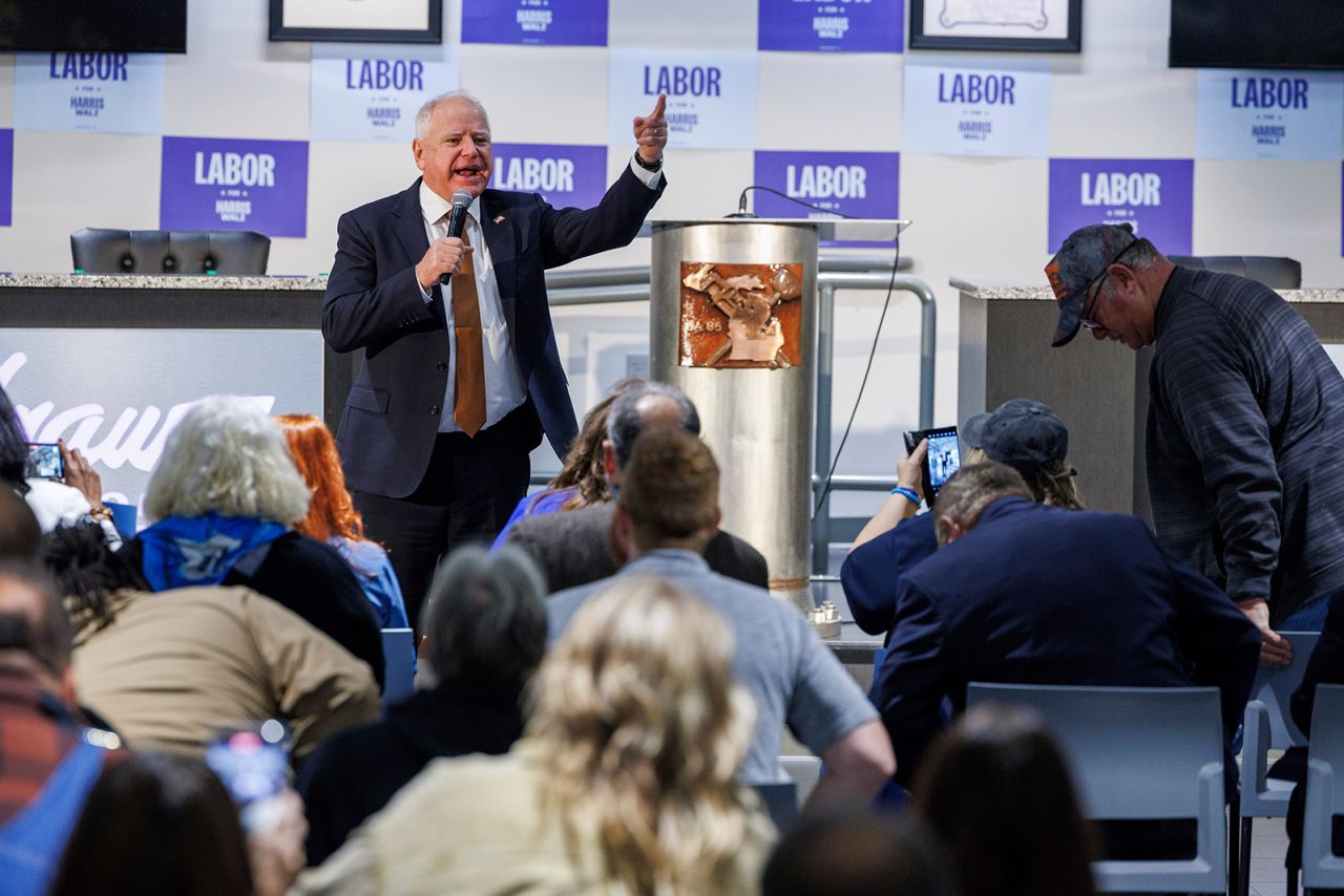 Tim Walz speaks to union members during a campaign stop in Saginaw, Michigan, on October 20.