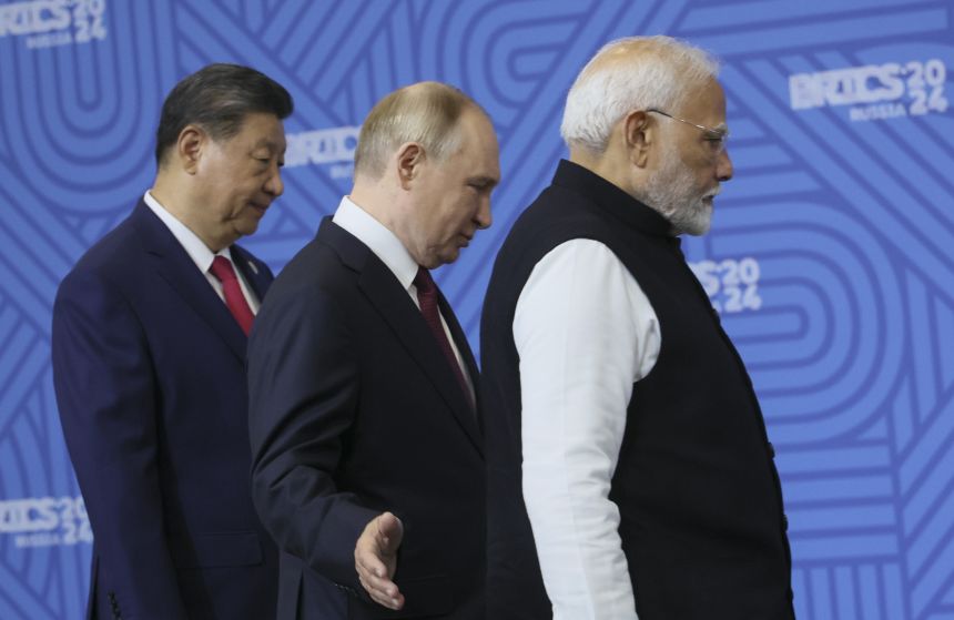From left: Chinese leader Xi Jinping, Russian President Vladimir Putin and Indian Prime Minister Narendra Modi prior to the BRICS Summit plenary session in Russia in 2024.