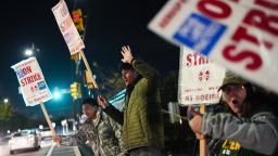 Boeing employees work the picket line in Renton, Washington, late Wednesday after union members voted to reject a new contract offer from the company.