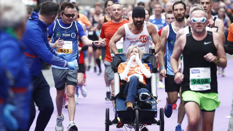 Colin Farrell finishes Dublin Marathon while pushing friend in a wheelchair | CNN