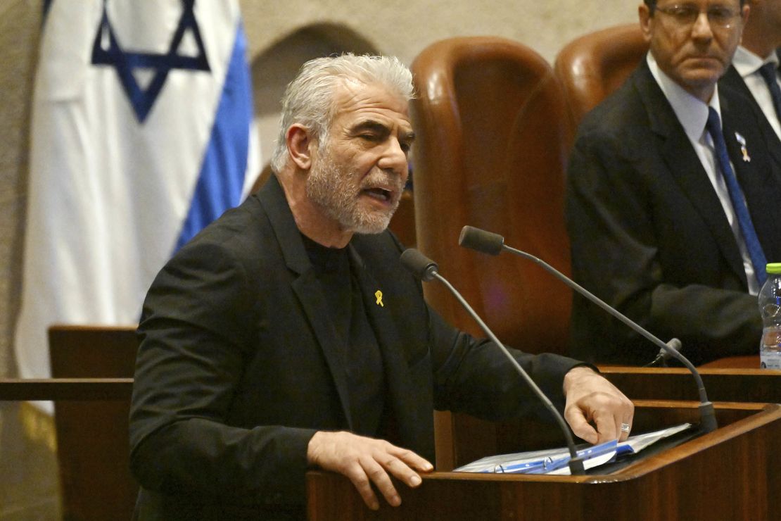 Opposition leader Yair Lapid speaks in Israel's parliament in October last year.