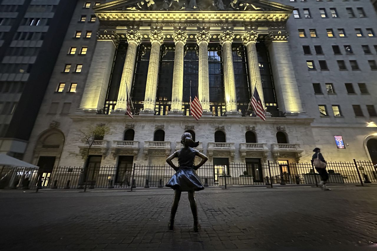 The Fearless Girl statue is shown in front of the New York Stock Exchange on October 30.