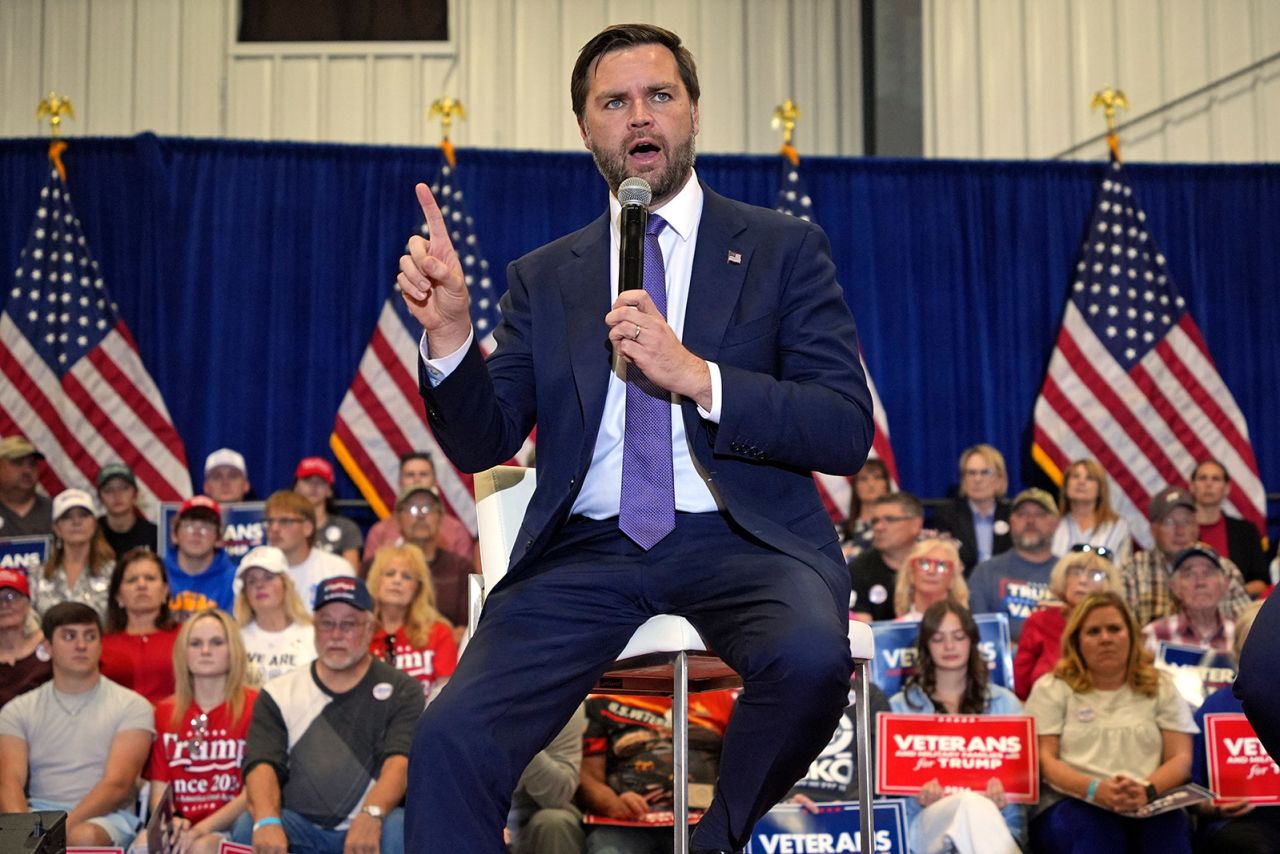 Republican vice presidential nominee Sen. JD Vance speaks during a town hall meeting at the Bedford County Airport in Bedford, Pennsylvania, on October 30, 2024.