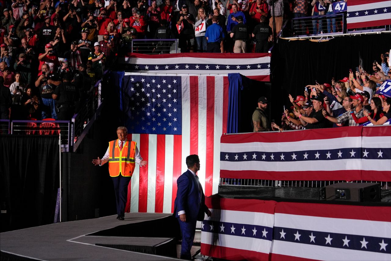 Republican presidential nominee former President Donald Trump arrives during a campaign rally in Green Bay, Wisconsin, on October 30.