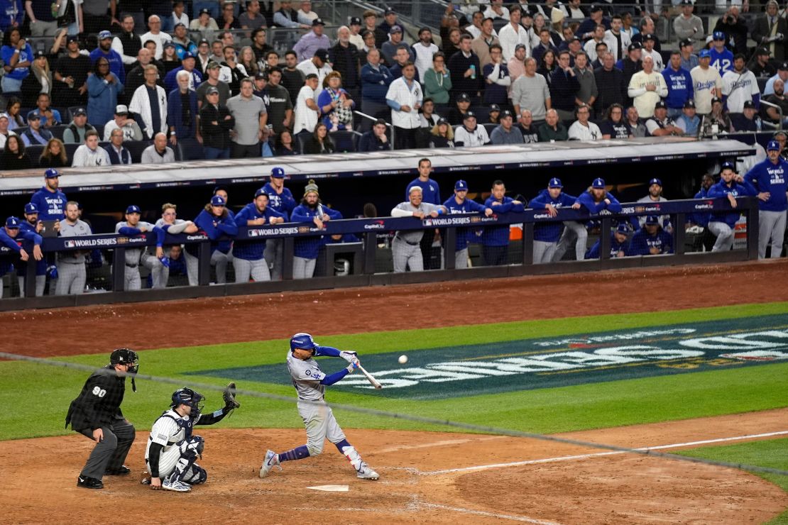 Los Angeles Dodgers' Mookie Betts hits a sacrifice fly in the eighth inning to give the team its first lead of the game.