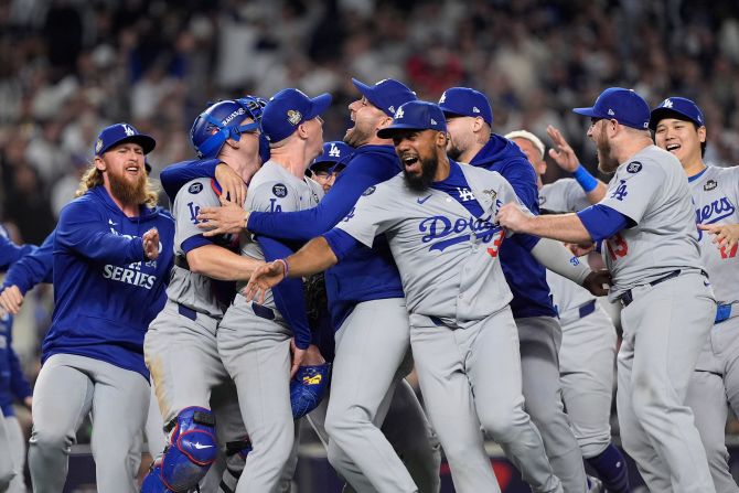 The Los Angeles Dodgers celebrate after they defeated the New York Yankees to win the World Series on Wednesday, October 30. <a href="index.php?page=&url=https%3A%2F%2Fwww.cnn.com%2F2024%2F10%2F30%2Fsport%2Fyankees-dodgers-world-series-game-5-spt-intl%2Findex.html">The Dodgers overcame a five-run deficit in Game 5</a> to win 7-6.