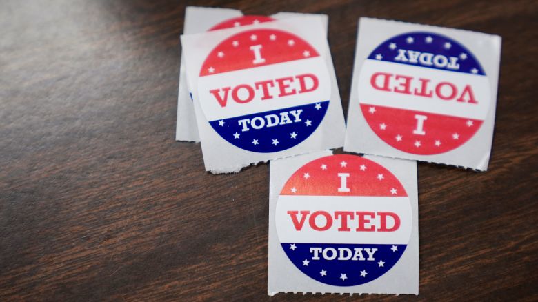 "I voted today" stickers are displayed at the polling place at Black Mountain Library during the first day of early in-person voting, Thursday, Oct. 17, 2024, in Black Mountain, N.C. (AP Photo/Stephanie Scarbrough)
