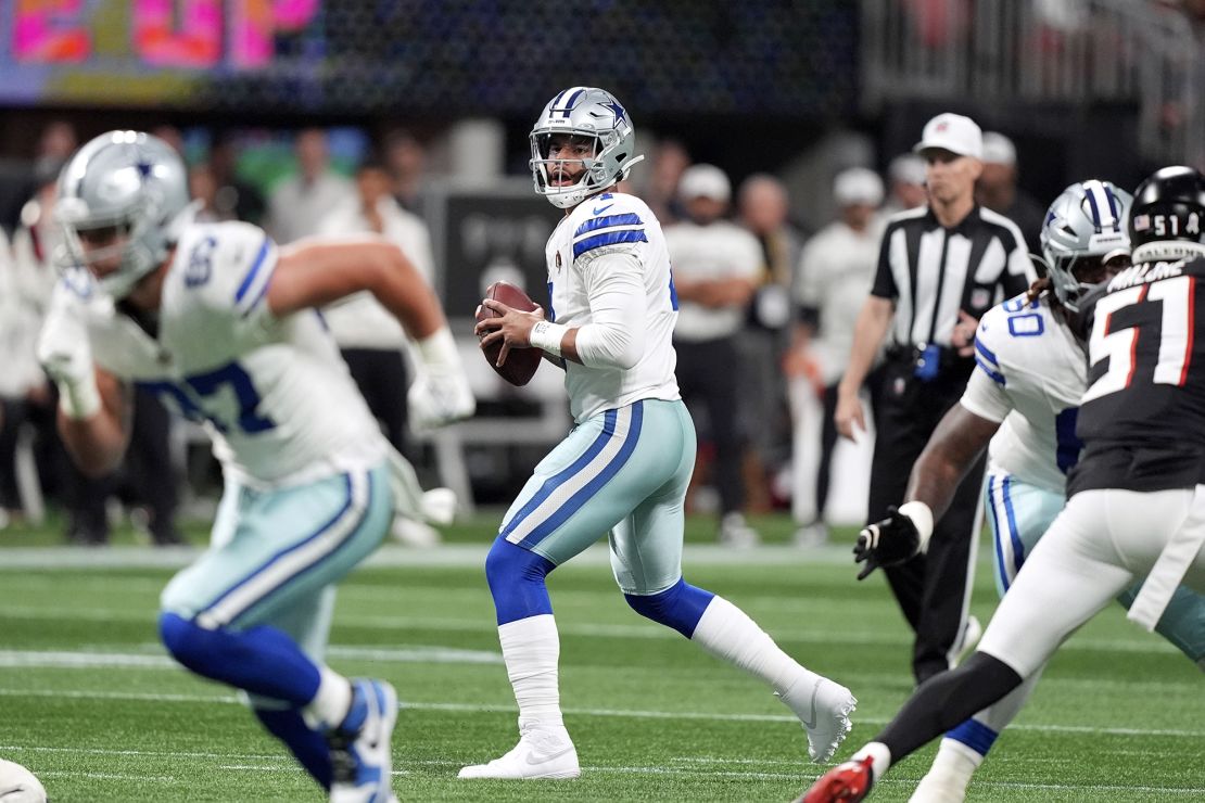 Prescott in action against the Atlanta Falcons in Week 9 before he exited the game with injury.