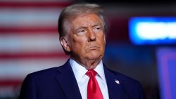 Republican presidential nominee former President Donald Trump listens during a campaign rally at Santander Arena, on November 4, 2024, in Reading, Pennsylvania.