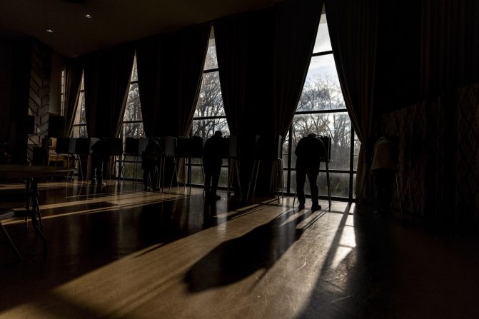 Voters fill out their ballots at the First Presbyterian Church of Dearborn, Michigan, on Tuesday.