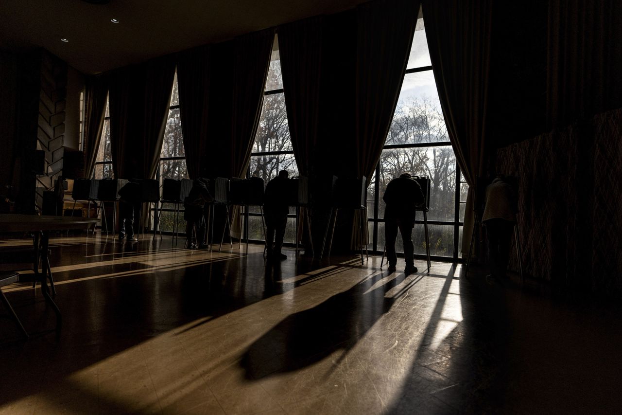 A voter fills out a ballot at a polling place in Dearborn, Michigan, on Tuesday.