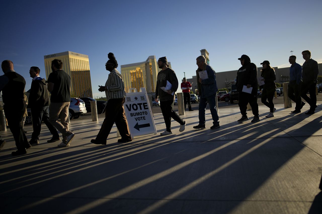 People line up to vote outside Allegiant Stadium on November 5, in Las Vegas.