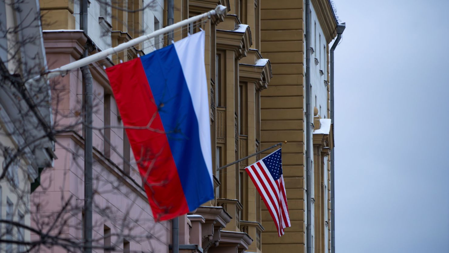 The US Embassy with a US national flag is seen behind a building with a Russian national flag in Moscow on November 5, 2024.