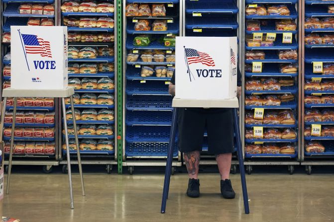 Steven Vandenburgh votes at a grocery store in Lawrence, Kansas, on Tuesday.