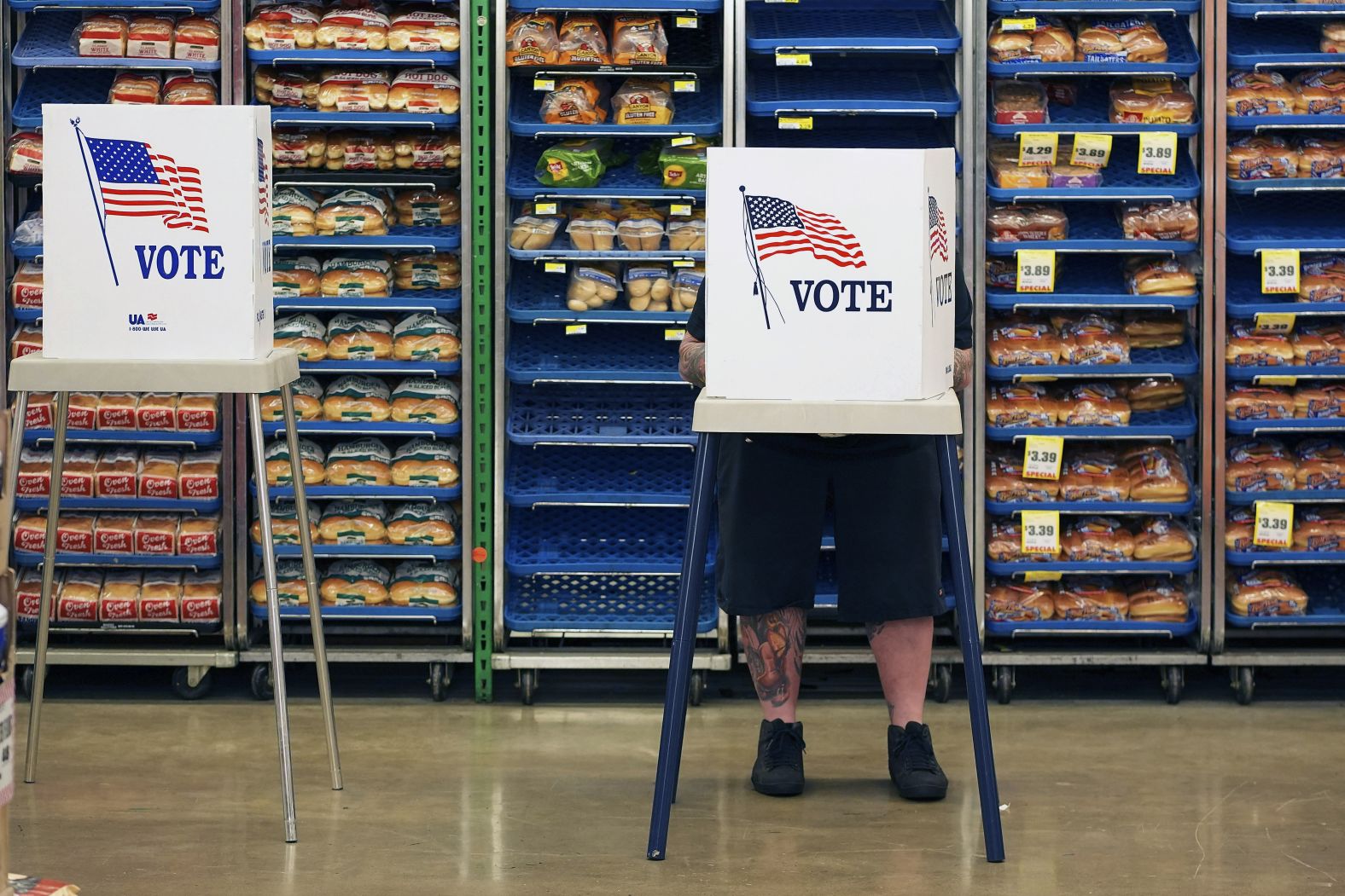 Steven Vandenburgh votes at a grocery store in Lawrence, Kansas, on Tuesday.