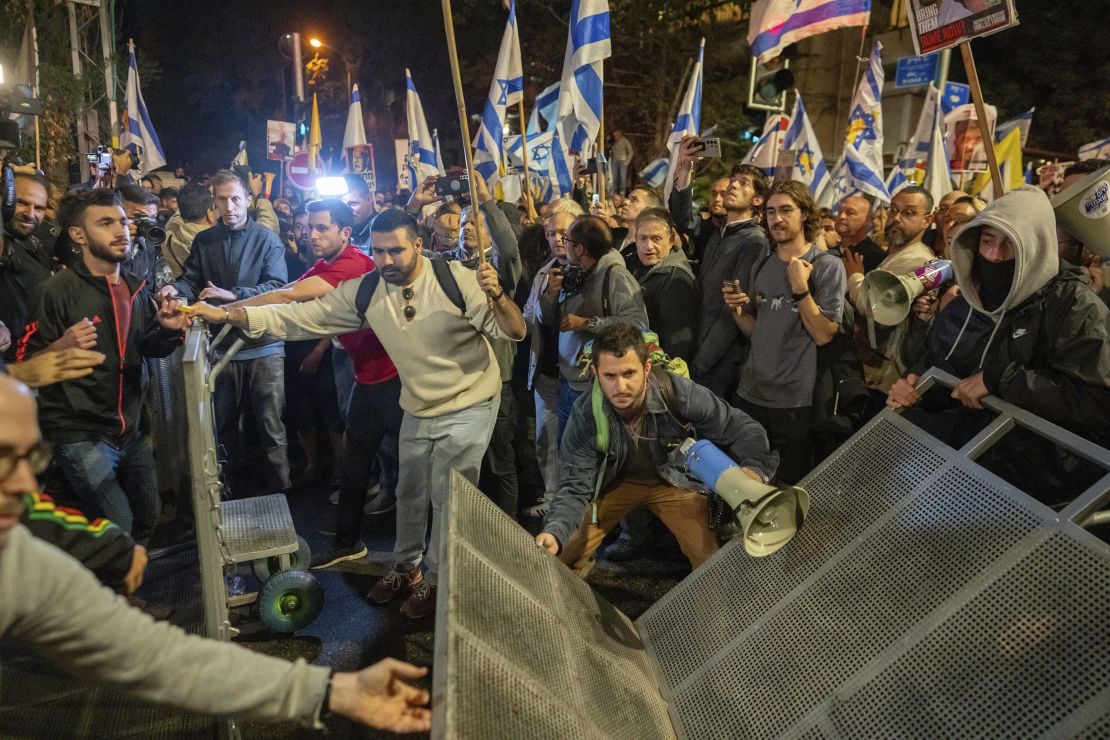 People protest near the residence of Prime Minister Benjamin Netanyahu in Jerusalem after he dismissed his defense minister Yoav Gallant in a surprise announcement Tuesday, Nov. 5, 2024.