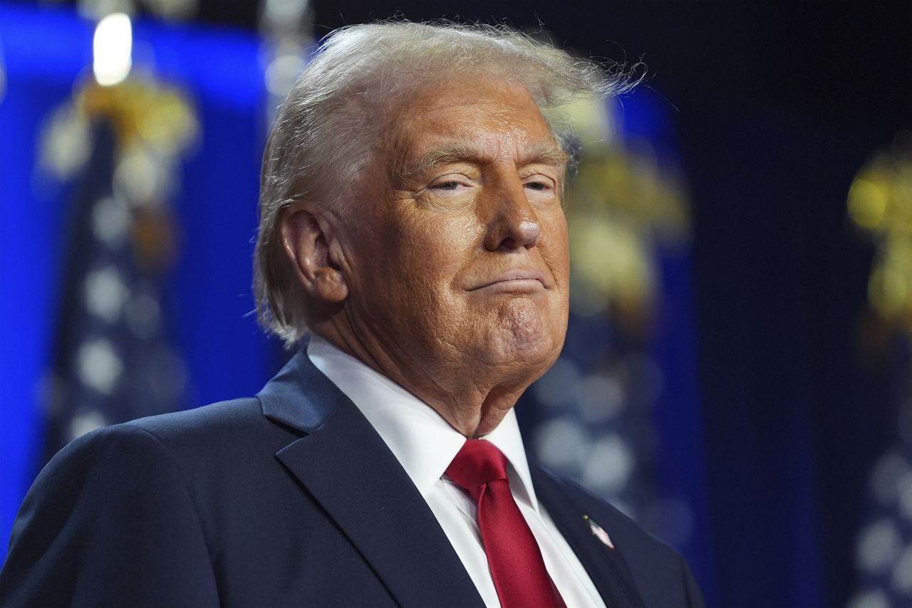 Former President Donald Trump arrives at an election night watch party at the Palm Beach Convention Center, Florida, on November 6.