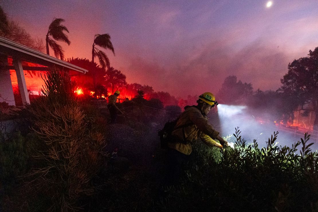 California is being lashed by powerful winds that fed the Mountain Fire, which destroyed homes and forced hundreds of residents to flee in Ventura County.