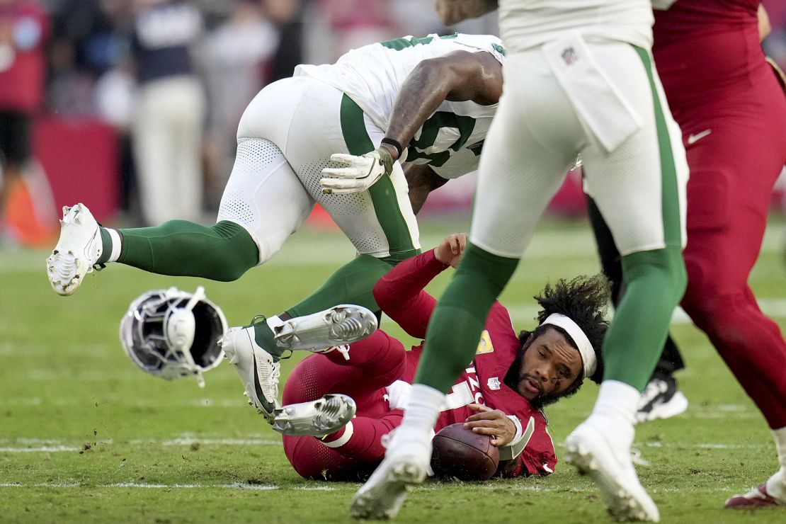 Murray had his helmet ripped off during a sack against the Jets.