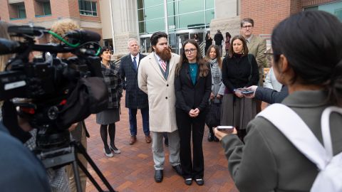 Jennifer Adkins and her husband, John, from Caldwell, Idaho talk to the media outside the Ada County Courthouse in Boise, Idaho, on December 14, 2023.