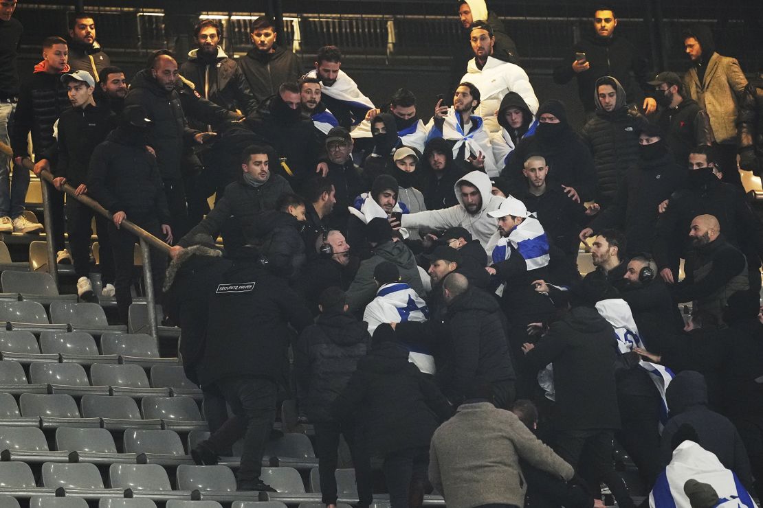 Fans argue on stands during the UEFA Nations League soccer match between France and Israel at the Stade de France stadium in Saint-Denis, outside Paris, on November 14, 2024.