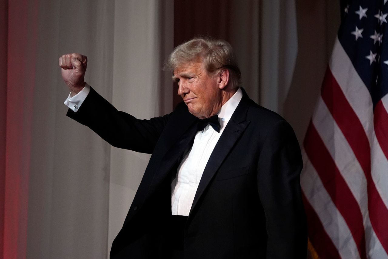 President-elect Donald Trump gestures after speaking during an America First Policy Institute gala at his Mar-a-Lago estate in Palm Beach, Florida, on November 14.