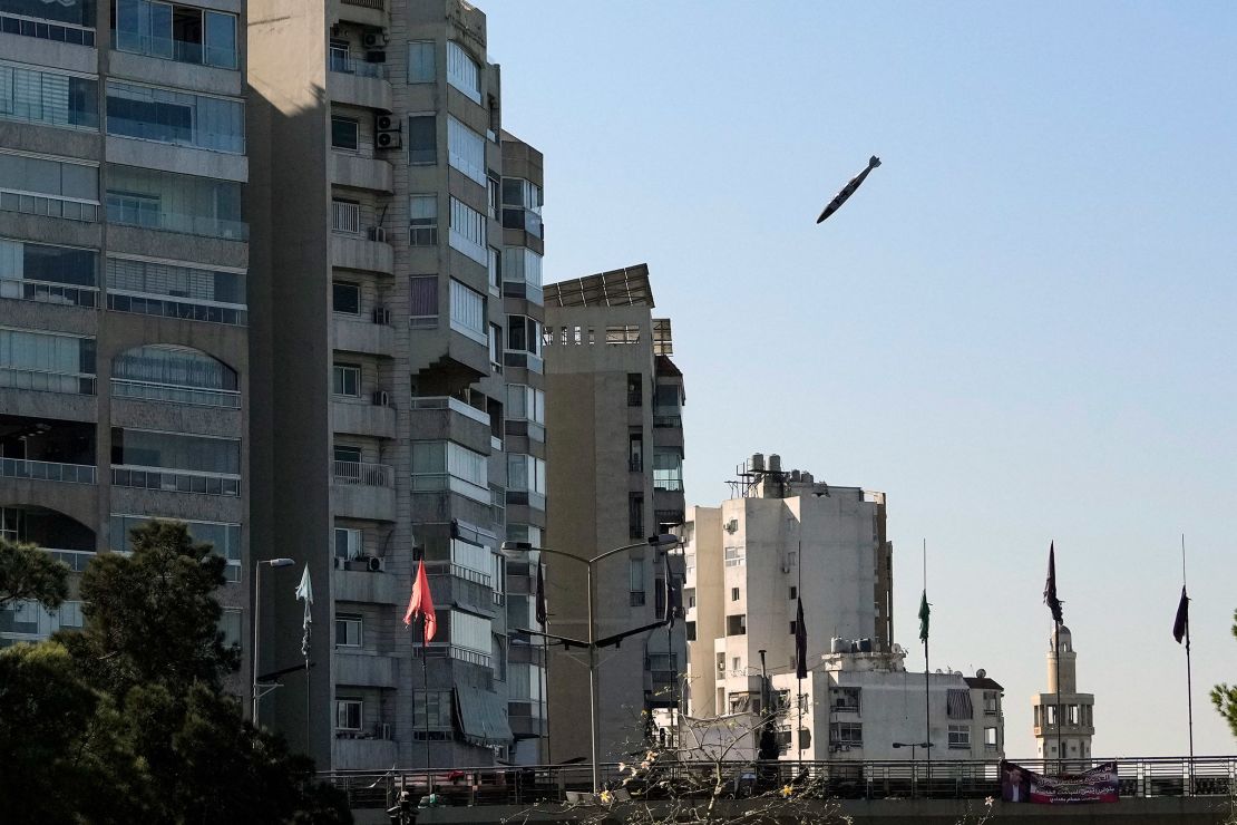 A bomb dropped from an Israeli jet prepares to hit a building in Tayouneh, Beirut, Lebanon, on November 15, 2024.